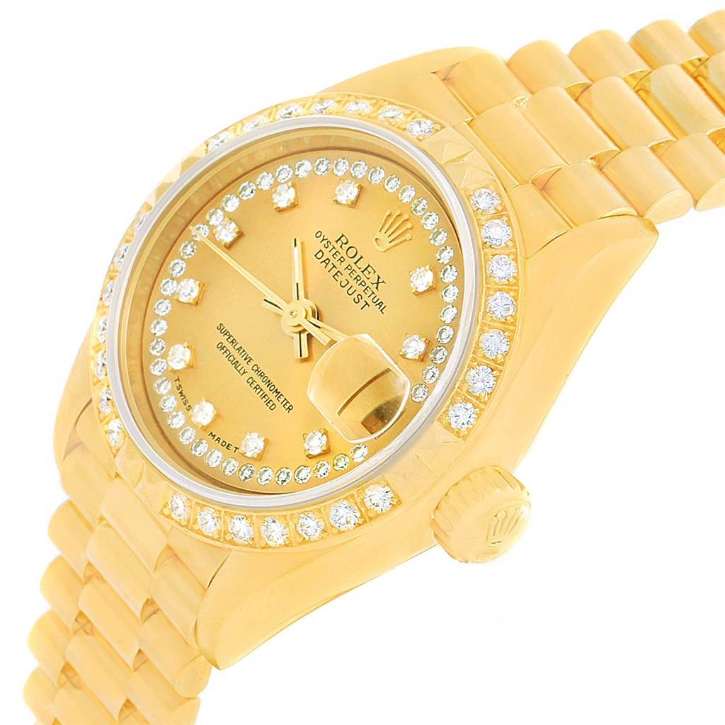 This image shows a close-up, angled view of a Rolex President 69158 Women's Yellow Gold Champagne Dial 69158 Women's Yellow Gold Champagne Dial model watch, highlighting the dial, bezel, and bracelet.