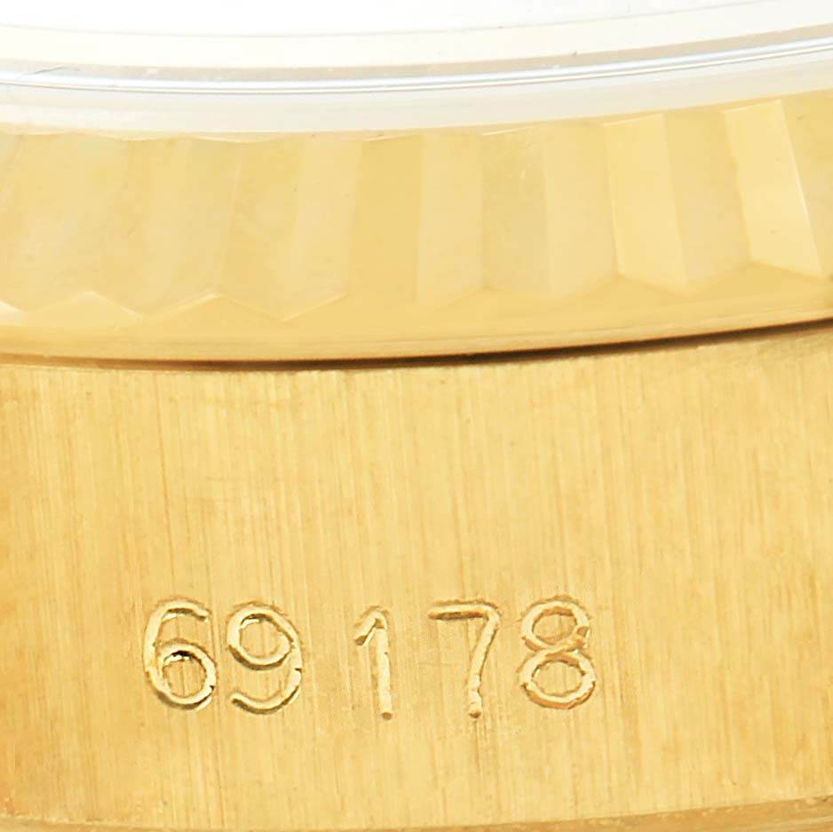This image shows a close-up of the model number engraving on the side of a Rolex President 69178 Women's Yellow Gold Champagne Dial 69178 Women's Yellow Gold Champagne Dial watch.
