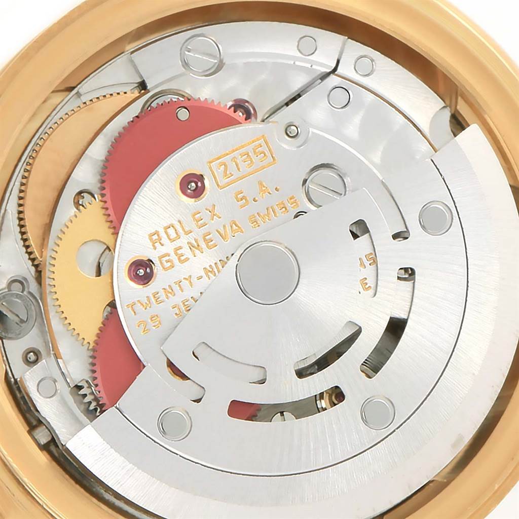 This image shows the internal movement of the Rolex President 69178 Women's Yellow Gold Champagne Dial 69178 Women's Yellow Gold Champagne Dial model watch, highlighting gears and mechanisms.