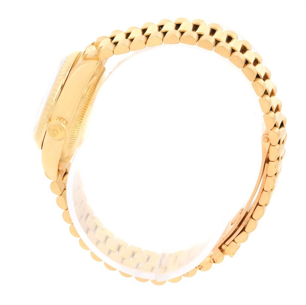 The image shows a side profile of a Rolex President 69178 Women's Yellow Gold White Dial 69178 Women's Yellow Gold White Dial model watch, highlighting the case, crown, and band.