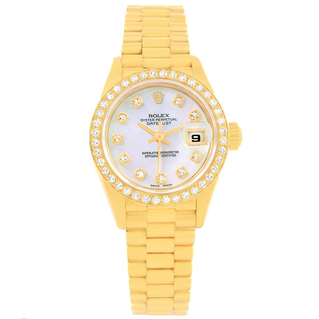 The image shows a frontal view of a Rolex President 69138 Women
s Yellow Gold Mother of Pearl Dial 69138 Women
s Yellow Gold Mother of Pearl Dial watch, highlighting its gold bracelet, diamond bezel, and date display.
