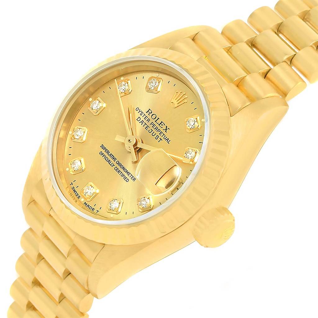 This image shows a Rolex President 69178 Women's Yellow Gold Champagne Dial 69178 Women's Yellow Gold Champagne Dial model watch from an angled view, highlighting its dial, crown, and part of the bracelet.