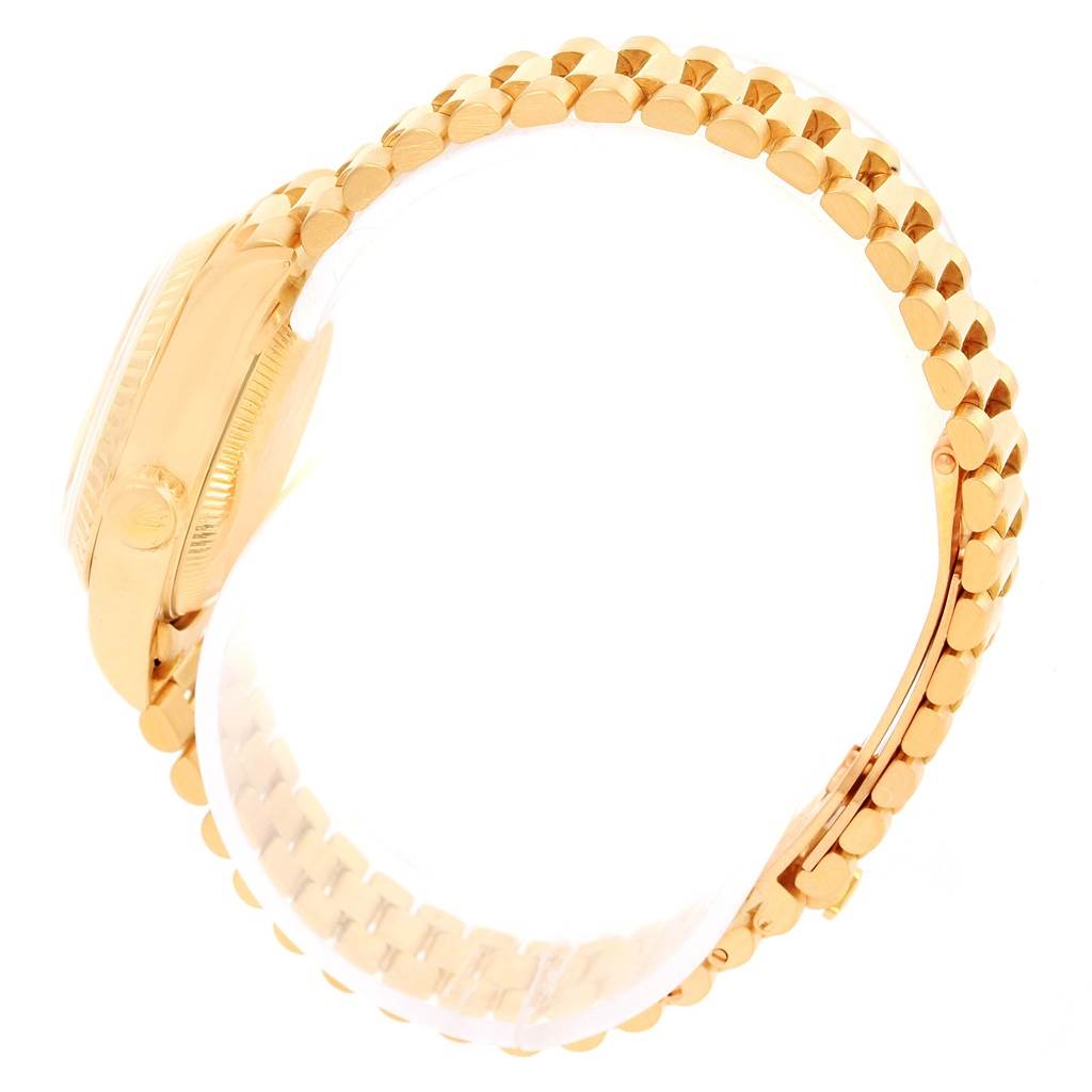 The image shows the side view of a Rolex President 69178 Women's Yellow Gold Champagne Dial 69178 Women's Yellow Gold Champagne Dial model watch, highlighting its gold case and bracelet.