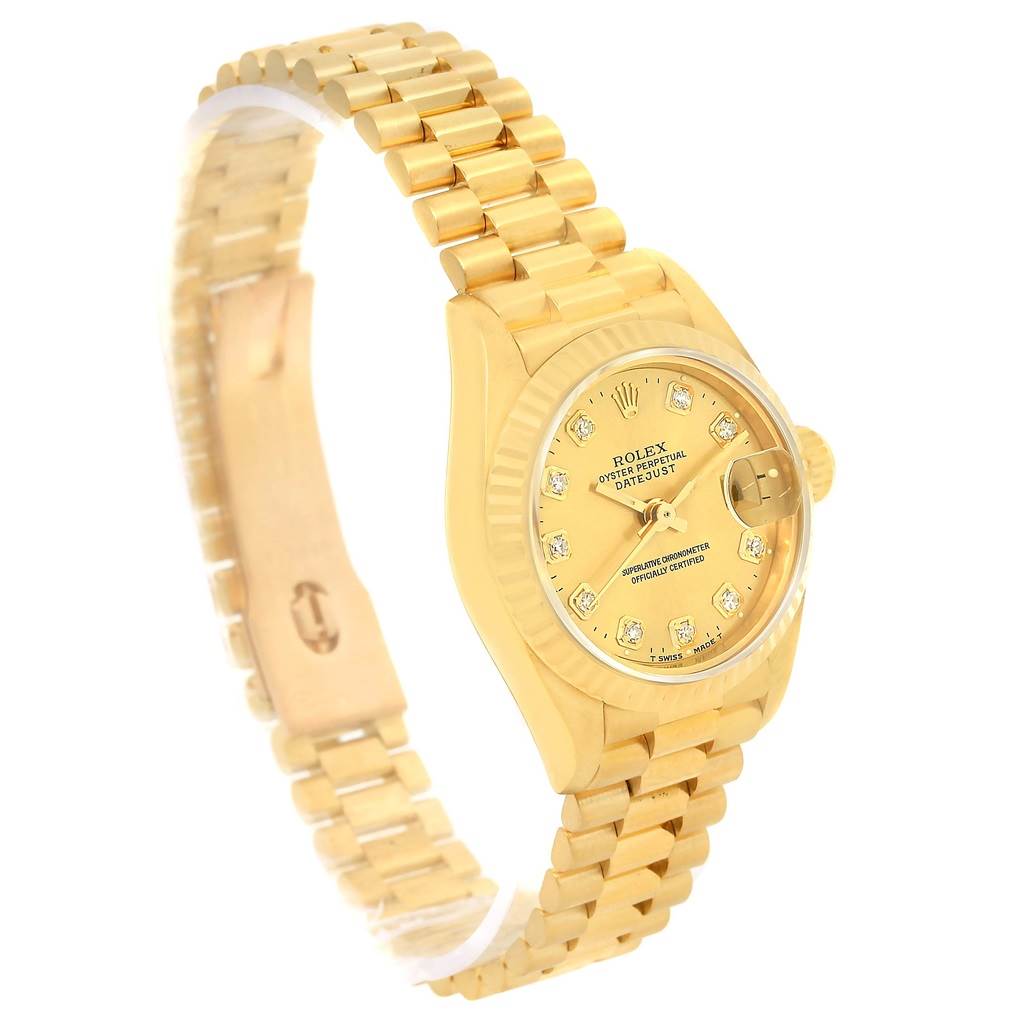 This image shows a side angle view of a Rolex President 69178 Women's Yellow Gold Champagne Dial 69178 Women's Yellow Gold Champagne Dial model watch, highlighting the gold band, clasp, and diamond-studded dial.