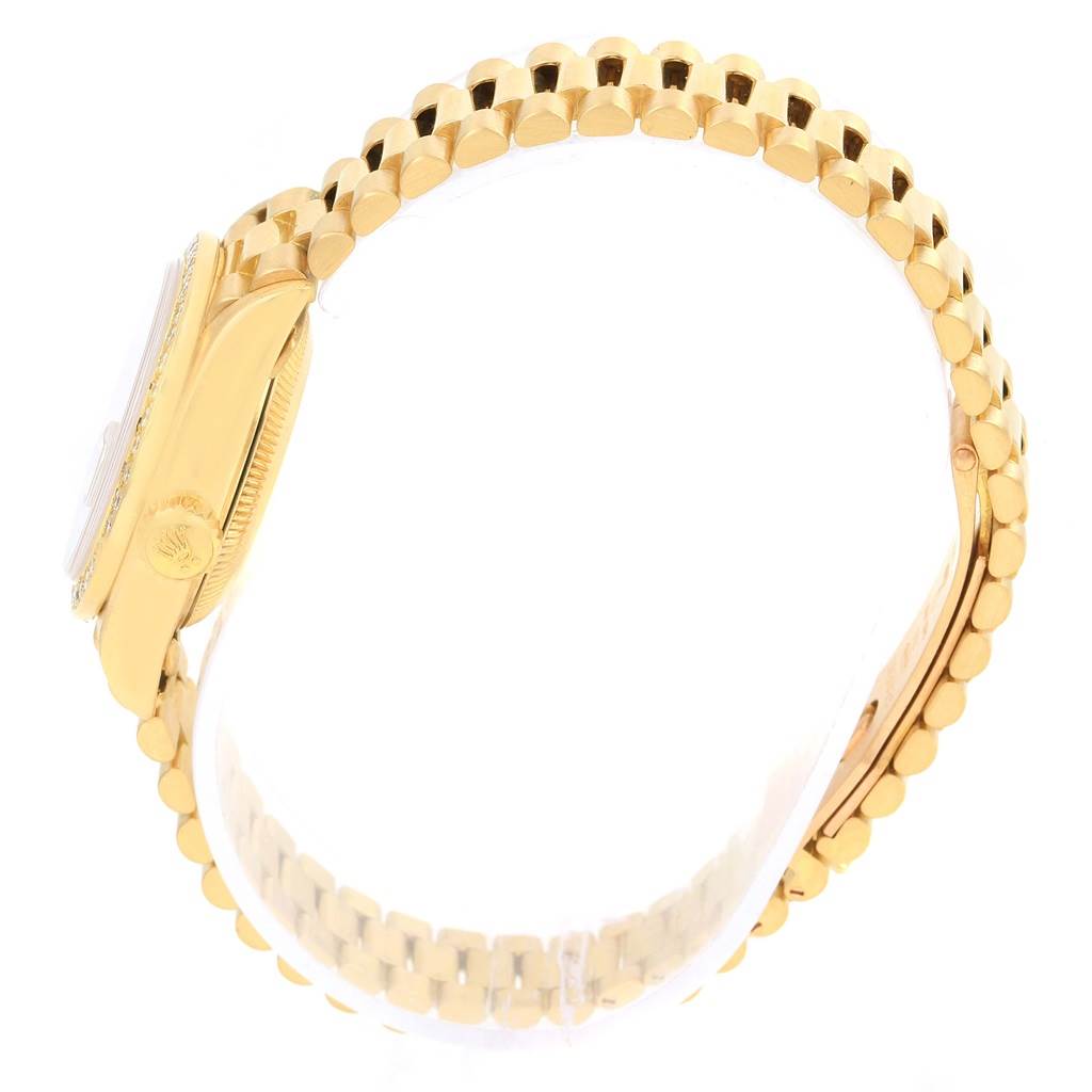 The image shows a side view of a Rolex President 69178 Women's Yellow Gold Champagne Dial 69178 Women's Yellow Gold Champagne Dial model, highlighting the case, crown, and part of the bracelet.