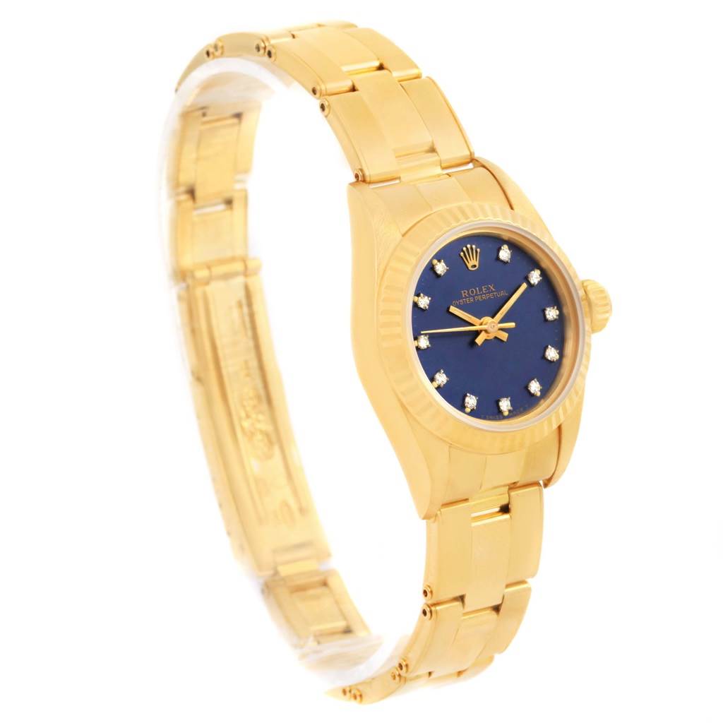 The image shows a side angle of a Rolex President 67198 Women's Yellow Gold Blue Dial 67198 Women's Yellow Gold Blue Dial model watch, highlighting its gold band and blue dial.