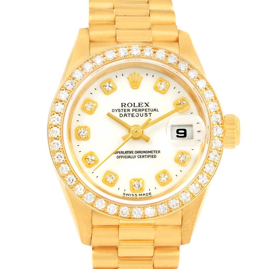 This image shows a Rolex President 69138 Women
s Yellow Gold White Dial 69138 Women
s Yellow Gold White Dial model watch from a front angle, including the bezel, dial, and part of the bracelet.