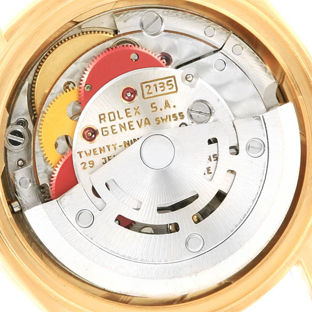 This image shows the movement and inner mechanisms of the Rolex President 69138 Women
s Yellow Gold White Dial 69138 Women
s Yellow Gold White Dial model watch.