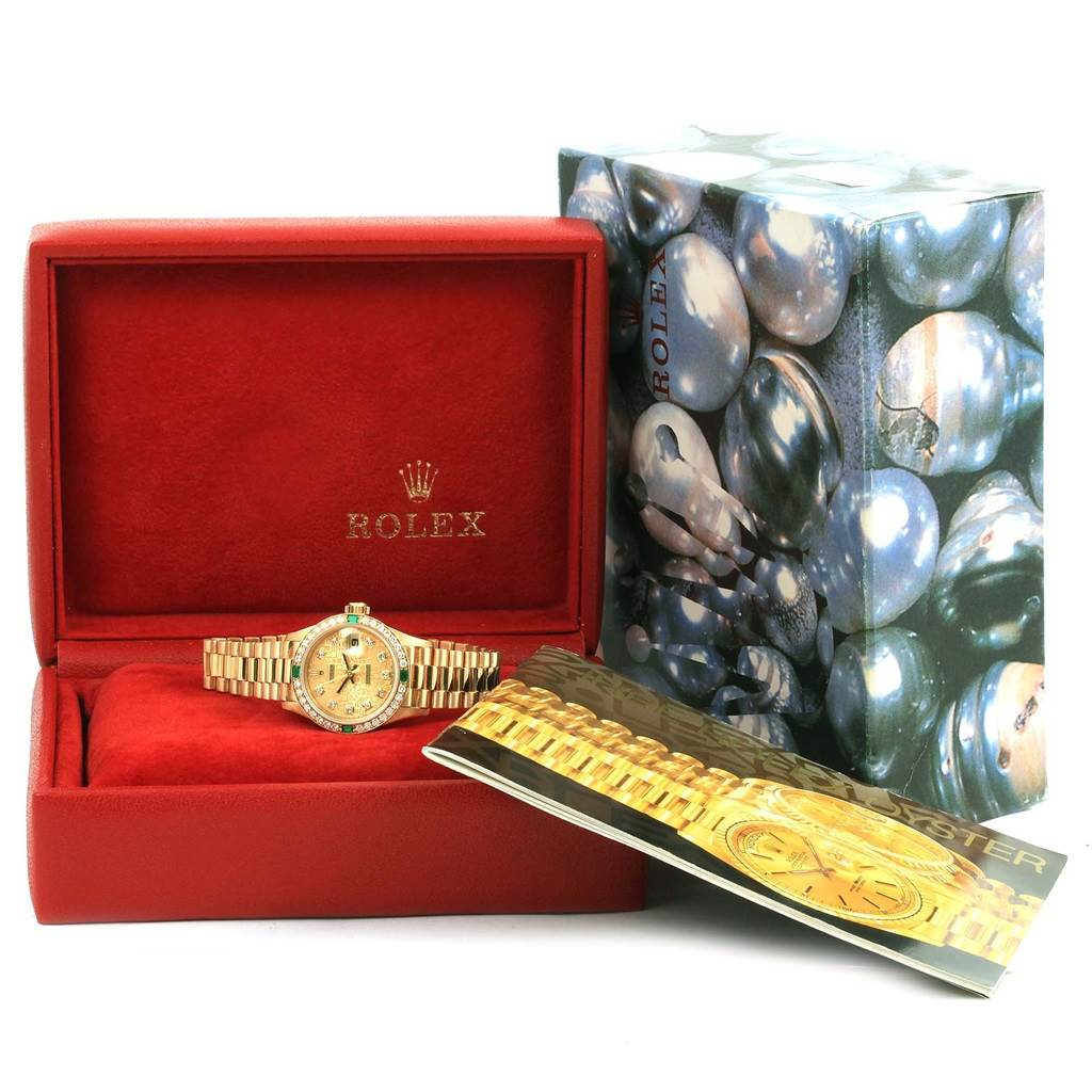The image shows a Rolex President 69078 Women's Yellow Gold Champagne Dial 69078 Women's Yellow Gold Champagne Dial model watch in its original box with packaging and a booklet.
