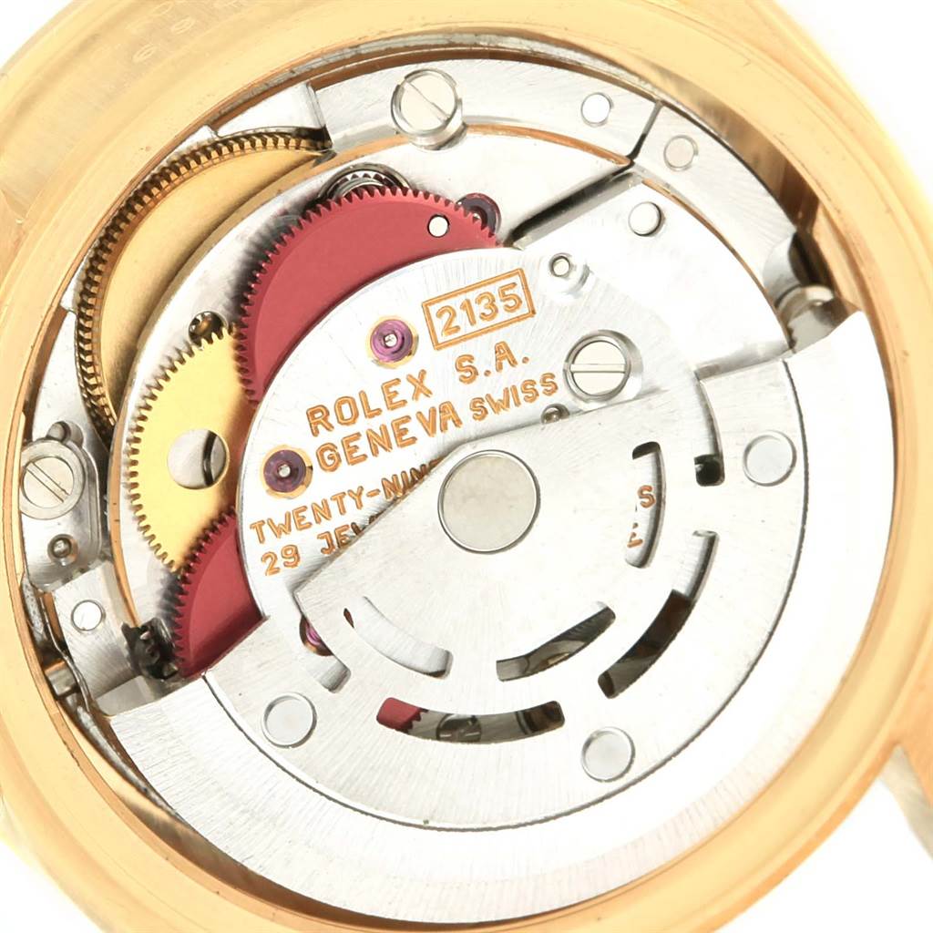 The image shows the movement mechanism of a Rolex President 69078 Women's Yellow Gold Champagne Dial 69078 Women's Yellow Gold Champagne Dial model, viewed from the back and showcasing its inner components.