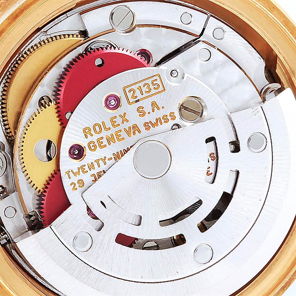 This is a close-up of the Rolex President 69158 Women's Yellow Gold Champagne Dial 69158 Women's Yellow Gold Champagne Dial watch movement, showcasing its intricate internal mechanism.
