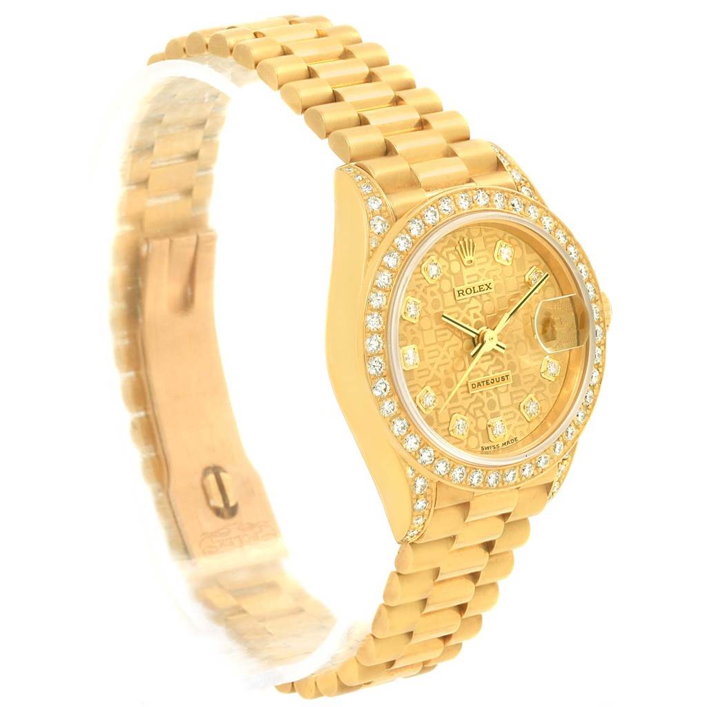 The image shows a Rolex President 69158 Women's Yellow Gold Champagne Dial 69158 Women's Yellow Gold Champagne Dial model watch at a slanted angle, displaying the watch face, bracelet, and clasp.
