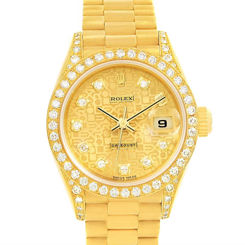 The image shows a front view of a Rolex President 69158 Women's Yellow Gold Champagne Dial 69158 Women's Yellow Gold Champagne Dial watch, highlighting its gold face, diamond indices, and date window.