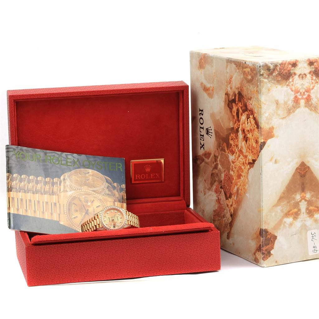 The image shows a Rolex President 69158 Women's Yellow Gold Champagne Dial 69158 Women's Yellow Gold Champagne Dial watch in its open red box with an accompanying booklet and outer packaging.