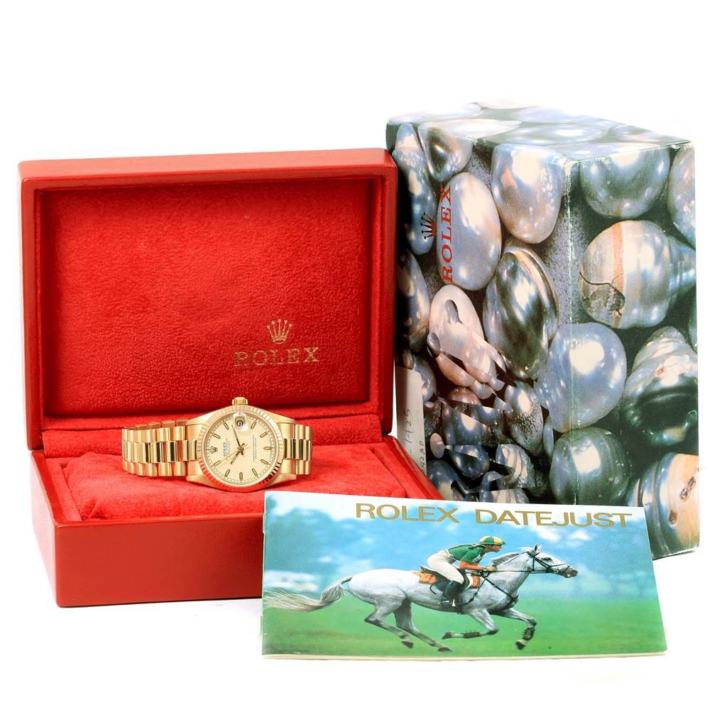 The image shows a Rolex President 68278 Women's Yellow Gold Beige Dial 68278 Women's Yellow Gold Beige Dial model watch in its open red box, alongside its outer box and manual.