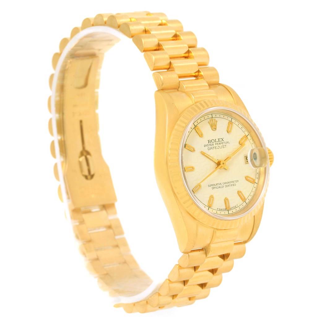 The image shows the side angle of a Rolex President 68278 Women's Yellow Gold Beige Dial 68278 Women's Yellow Gold Beige Dial model watch, showcasing the band, bezel, and dial with date display.