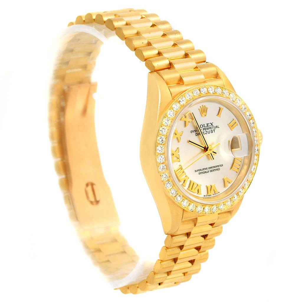 The image shows a Rolex President 79178 Women's Yellow Gold Mother of Pearl Dial 79178 Women's Yellow Gold Mother of Pearl Dial watch, angled to display its face, bezel, and part of the gold bracelet.