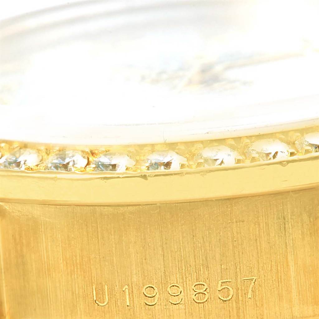 The image shows a close-up angle of the Rolex President 79178 Women's Yellow Gold Mother of Pearl Dial 79178 Women's Yellow Gold Mother of Pearl Dial model, highlighting the bezel with diamonds and partial serial number.
