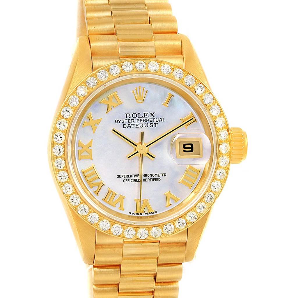 The image shows a front view of the Rolex President 79178 Women's Yellow Gold Mother of Pearl Dial 79178 Women's Yellow Gold Mother of Pearl Dial model watch, featuring a gold case, diamond bezel, and a bracelet.