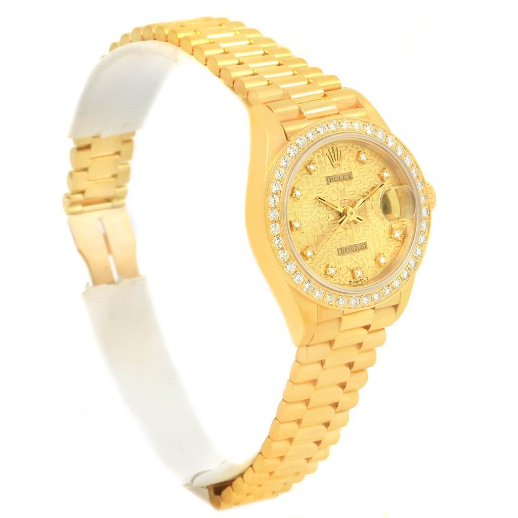 A Rolex President 69138 Women's Yellow Gold Champagne Dial 69138 Women's Yellow Gold Champagne Dial model watch is shown at a three-quarter angle, displaying the face, bezel, and bracelet.