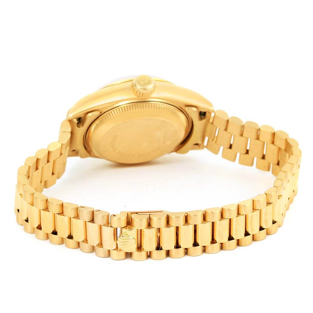 The image shows the back view of the Rolex President 69178 Women's Yellow Gold White Dial 69178 Women's Yellow Gold White Dial model, highlighting the case back, crown, and bracelet.