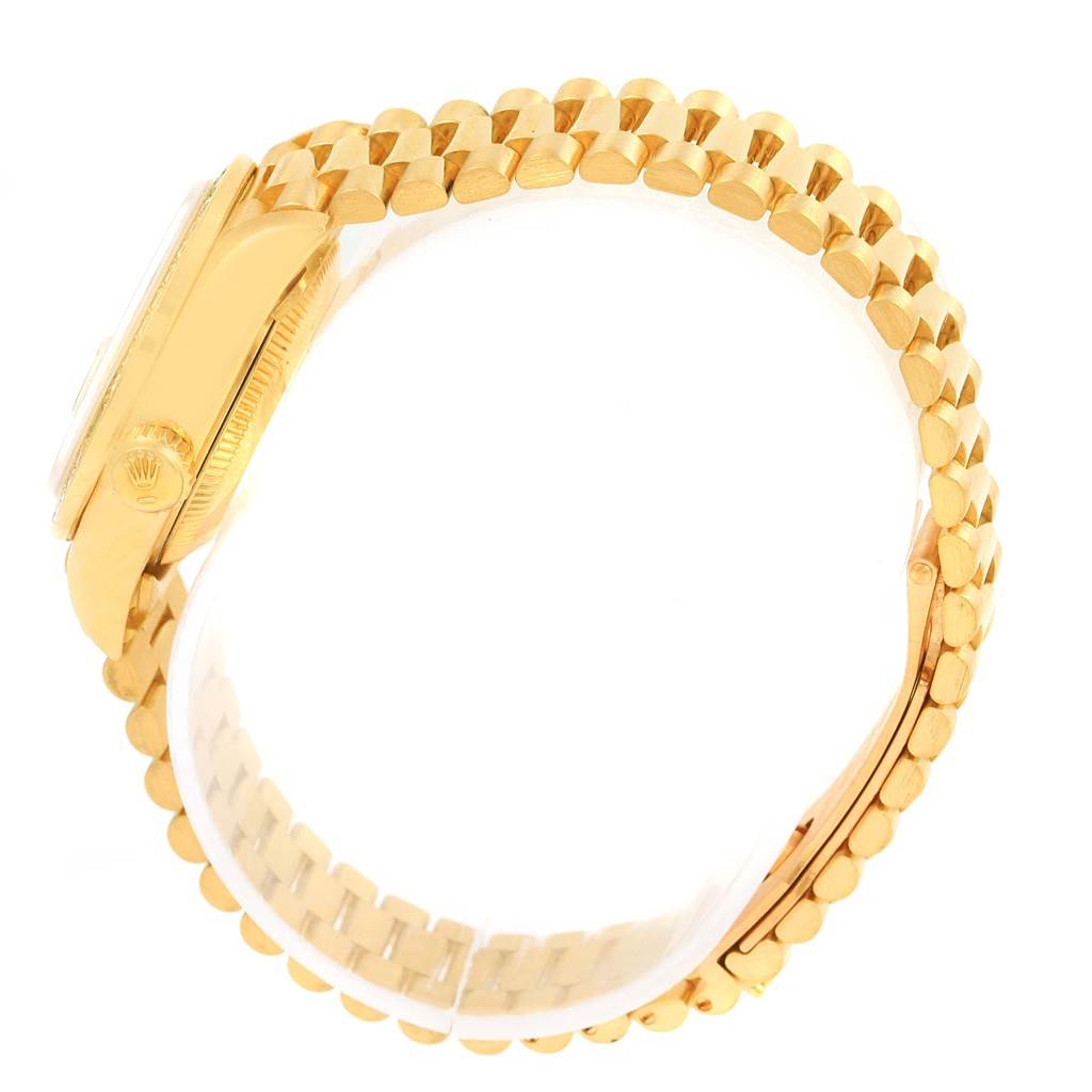 The image shows the side profile of a Rolex President 69078 Women's Yellow Gold Champagne Dial 69078 Women's Yellow Gold Champagne Dial model watch, highlighting its golden band and crown.