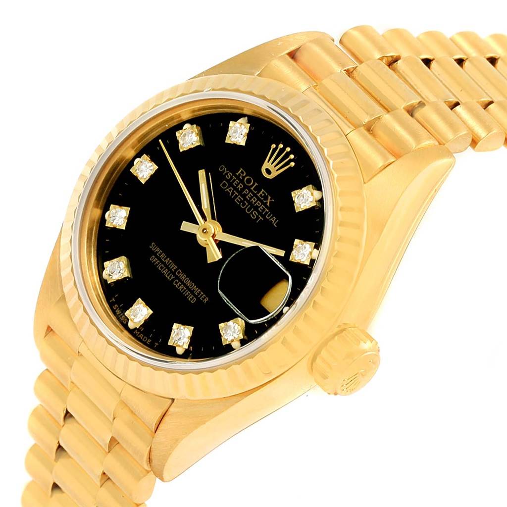 This image showcases a Rolex President 69178 Women's Yellow Gold Black Dial 69178 Women's Yellow Gold Black Dial model watch at an angled view, highlighting the dial, bezel, crown, and a portion of the bracelet.