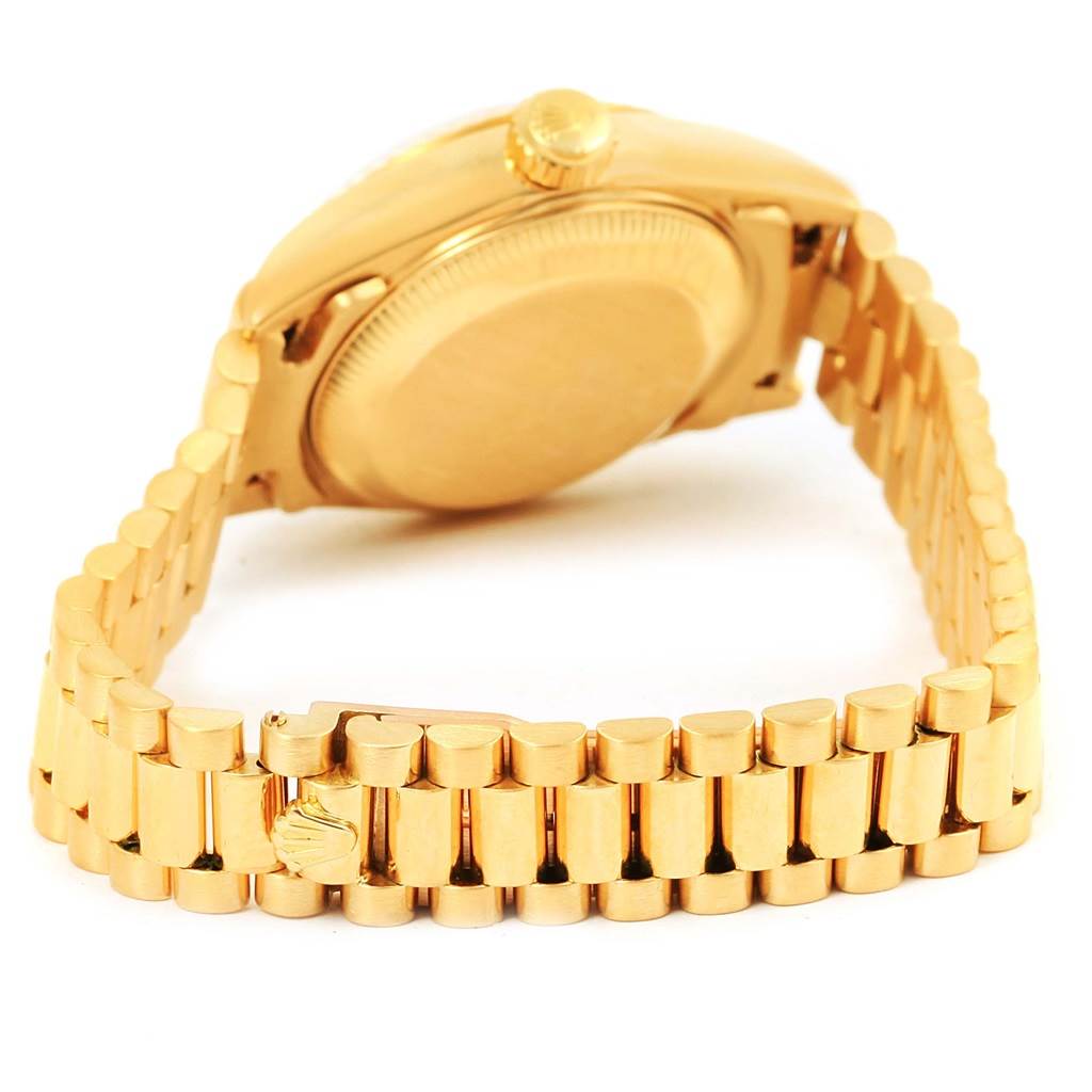 This image shows the back and side view of a Rolex President 69178 Women's Yellow Gold Black Dial 69178 Women's Yellow Gold Black Dial model watch, highlighting the bracelet and watch case.