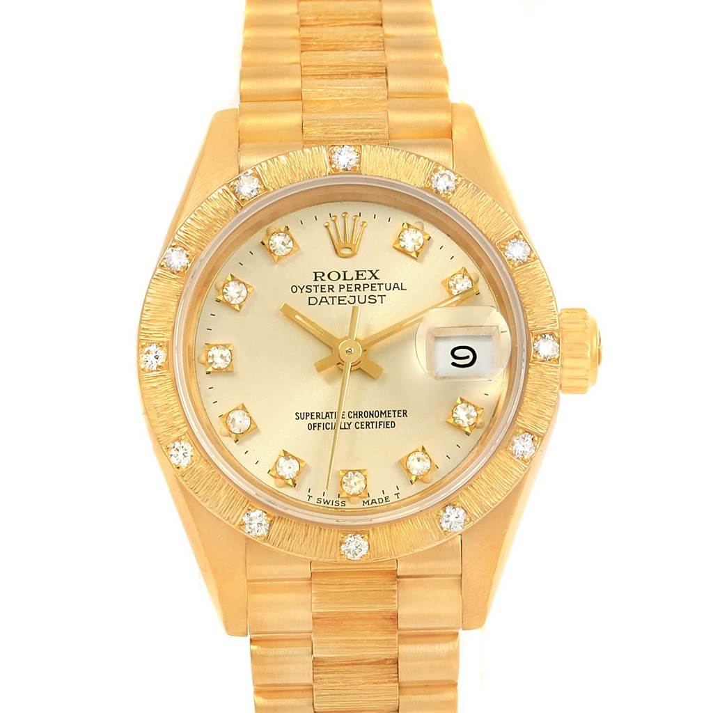 This image shows a frontal view of the Rolex President 69288 Women's Yellow Gold Silver Dial 69288 Women's Yellow Gold Silver Dial Datejust, highlighting its gold band, diamond-accented bezel, and date display.