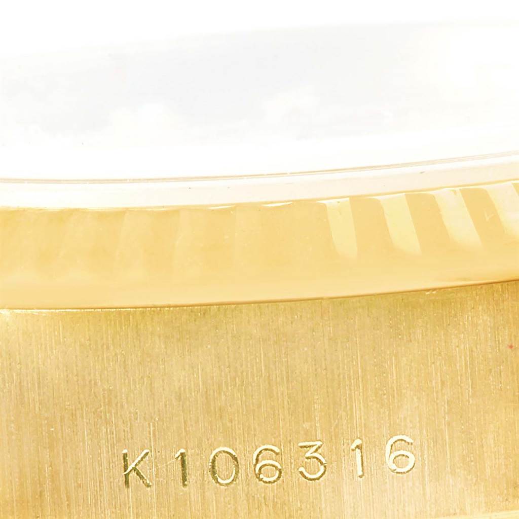 The image shows a close-up of the serial number and side of the bezel of a Rolex President 79178 Women's Yellow Gold Champagne Dial 79178 Women's Yellow Gold Champagne Dial model watch.