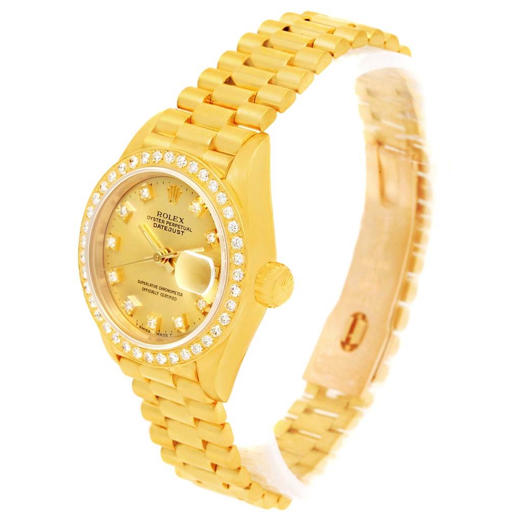 The image shows a gold Rolex President 69178 Women's Yellow Gold Champagne Dial 69178 Women's Yellow Gold Champagne Dial model watch at a slight angle, highlighting the dial, bezel, crown, and the bracelet.