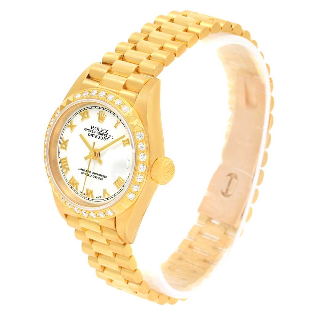 This image shows a Rolex President 79268 Women's Yellow Gold White Dial 79268 Women's Yellow Gold White Dial watch model from a front angle emphasizing the face, dial, crown, and bracelet.