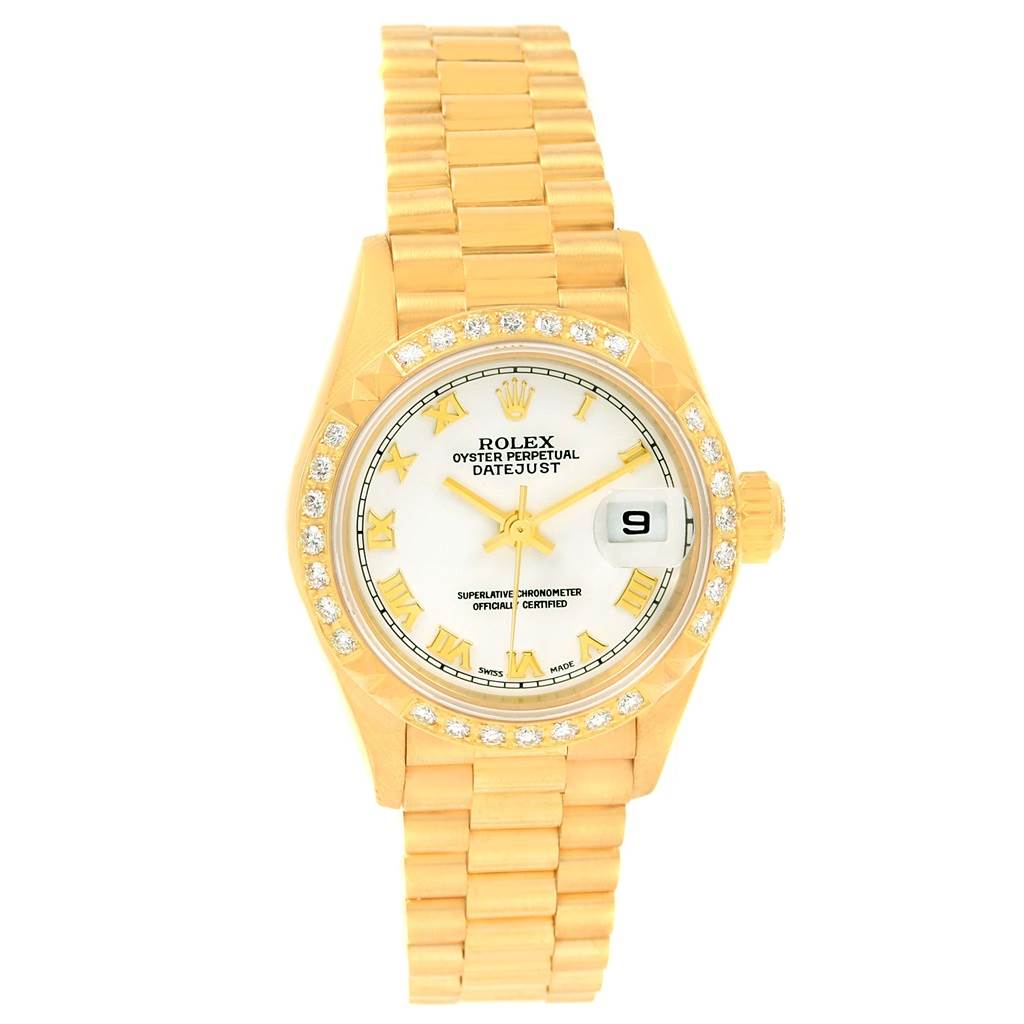 The Rolex President 79268 Women's Yellow Gold White Dial 79268 Women's Yellow Gold White Dial model watch is shown from a top-down angle, displaying its face, bezel, and bracelet.