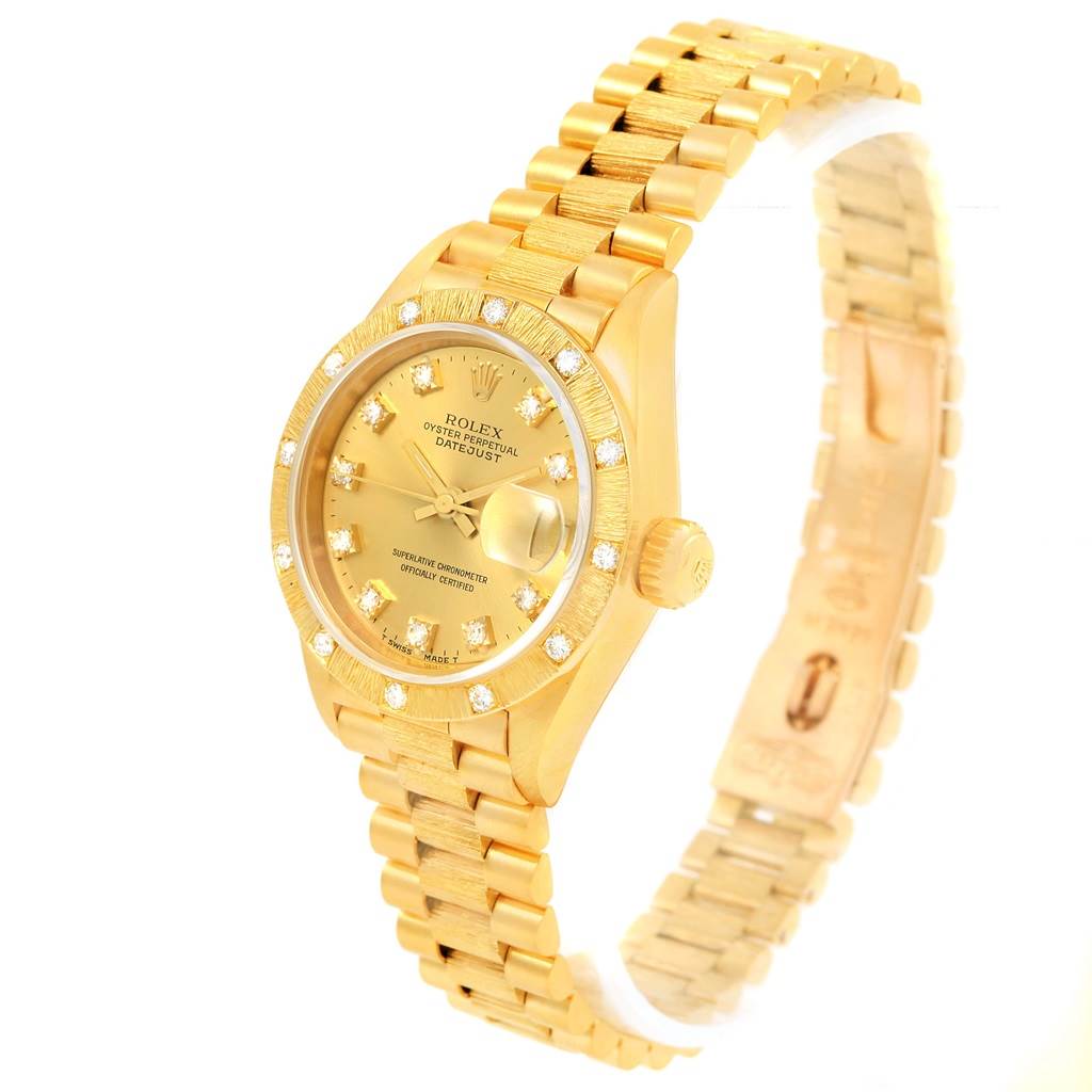 The image shows a Rolex President 69288 Women's Yellow Gold Champagne Dial 69288 Women's Yellow Gold Champagne Dial model watch at a slight angle, displaying its gold bracelet, bezel, dial, and crown.