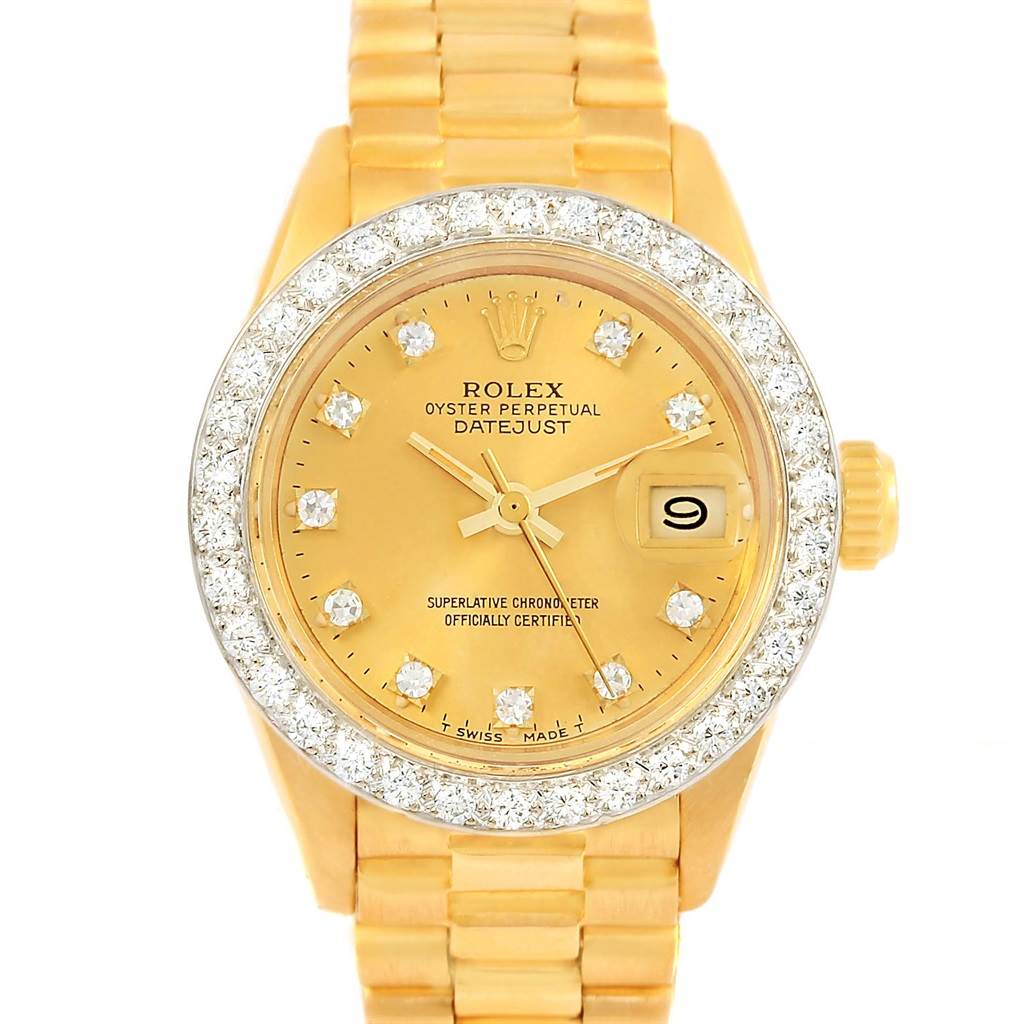 This image shows a frontal view of a Rolex President 6917 Women's Yellow Gold Champagne Dial 6917 Women's Yellow Gold Champagne Dial Datejust watch, highlighting its diamond-encrusted bezel, dial, and bracelet.