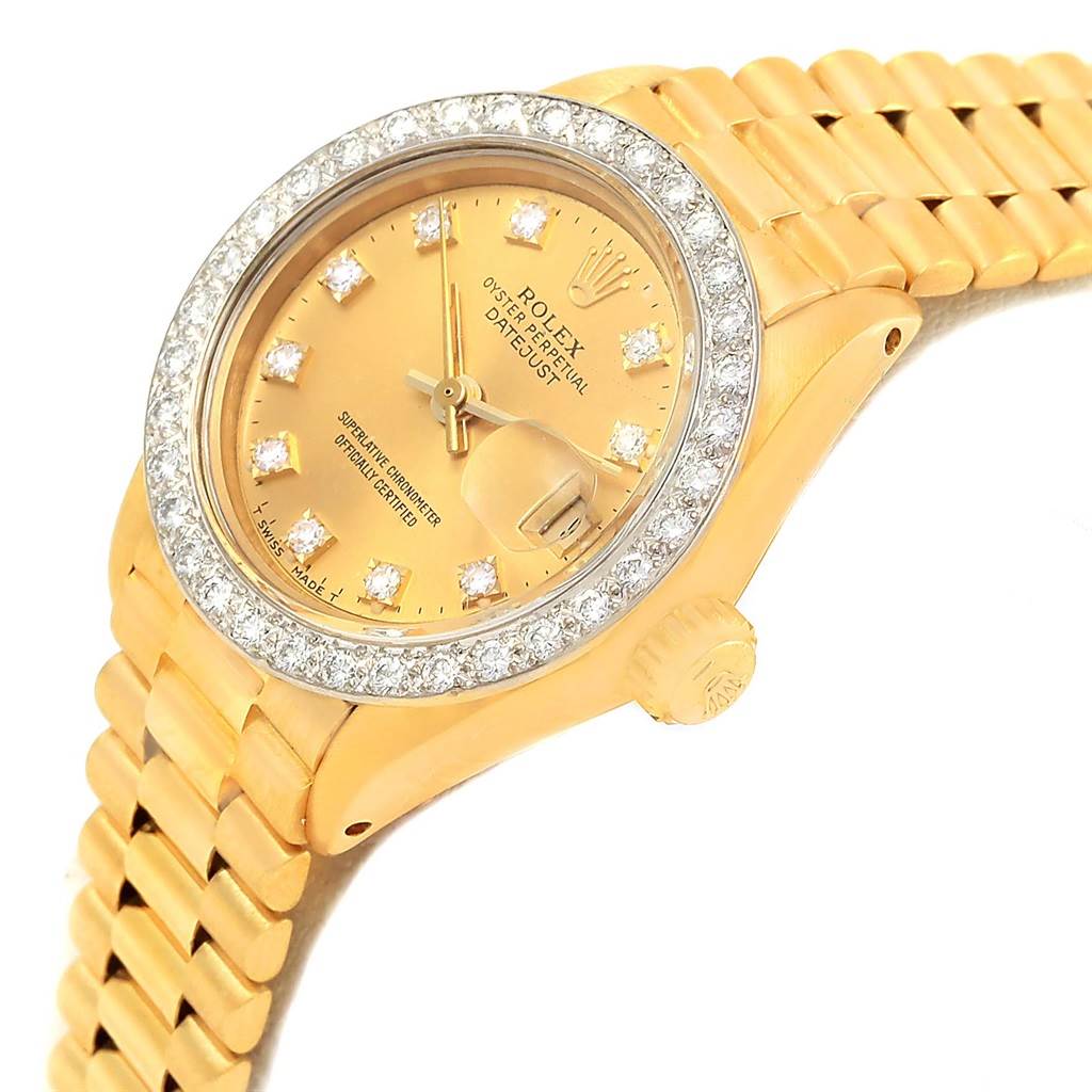 This image shows a high-angle view of the Rolex President 6917 Women's Yellow Gold Champagne Dial 6917 Women's Yellow Gold Champagne Dial model watch, highlighting the dial, bezel, and part of the bracelet.