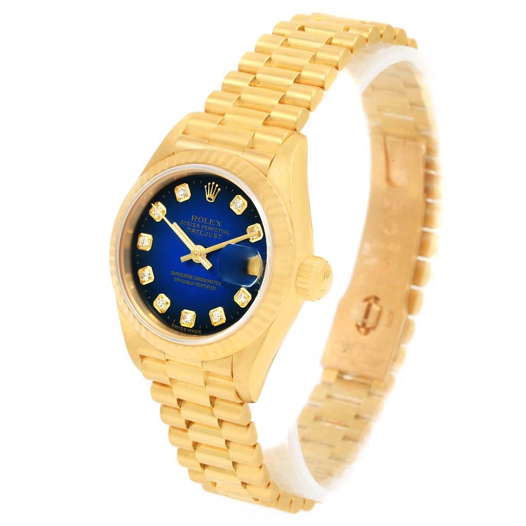 The image shows a Rolex President 69178 Women's Yellow Gold Blue Dial 69178 Women's Yellow Gold Blue Dial watch with a gold bracelet, blue dial, and gold accents at a three-quarter angle.