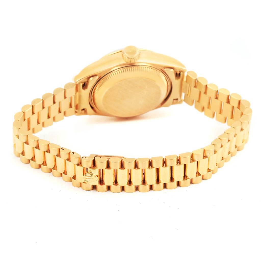 The image shows the back and bracelet of a Rolex President 69178 Women's Yellow Gold Blue Dial 69178 Women's Yellow Gold Blue Dial model watch from a rear angle.