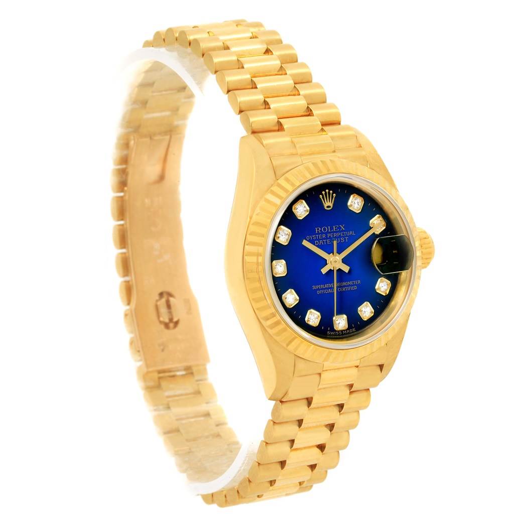 This image shows the full Rolex President 69178 Women's Yellow Gold Blue Dial 69178 Women's Yellow Gold Blue Dial model watch at a 3/4 angle, highlighting the blue dial, gold band, and case.