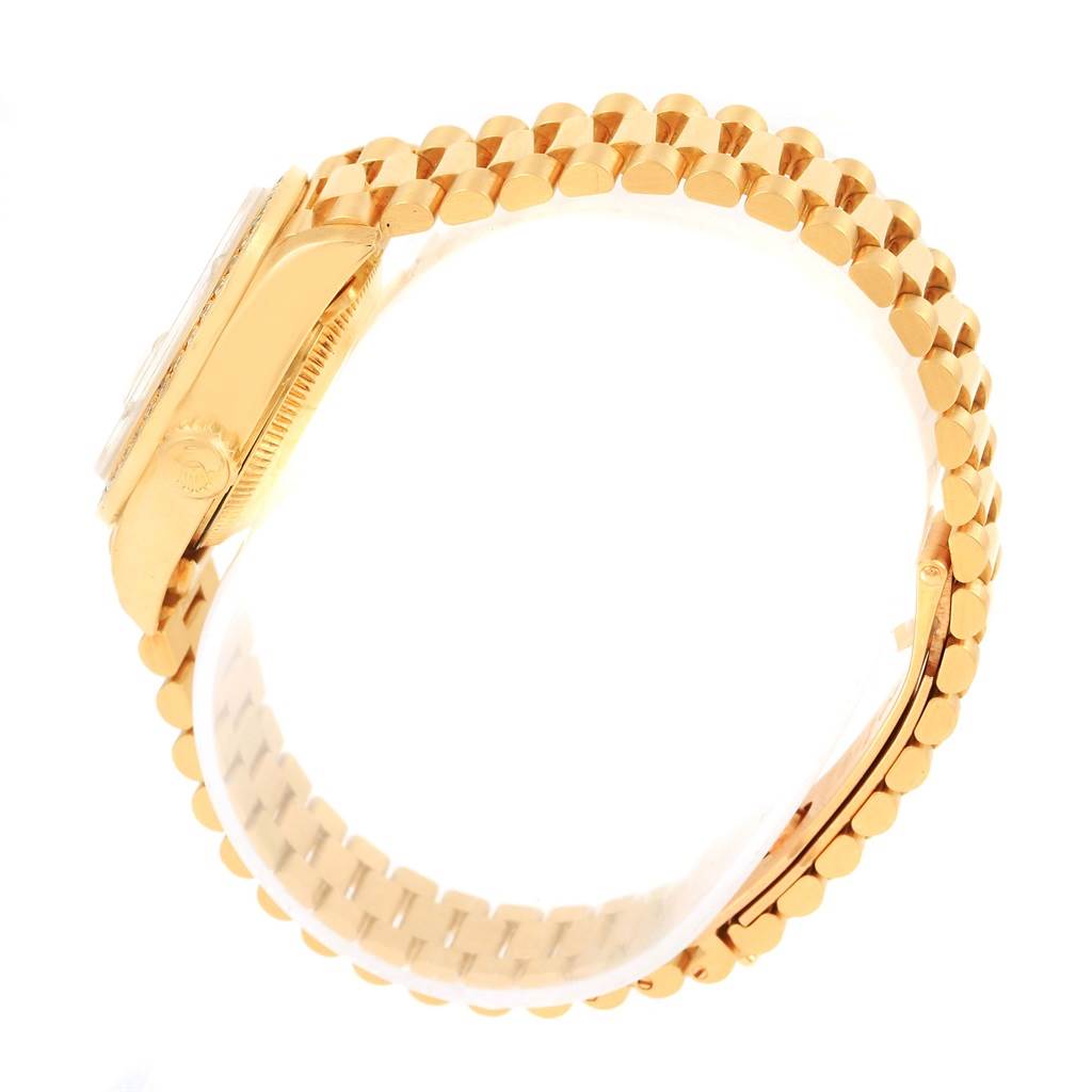 The image shows a side view of the Rolex President 69178 Women's Yellow Gold Champagne Dial 69178 Women's Yellow Gold Champagne Dial watch, focusing on the gold bracelet and side case with the crown.