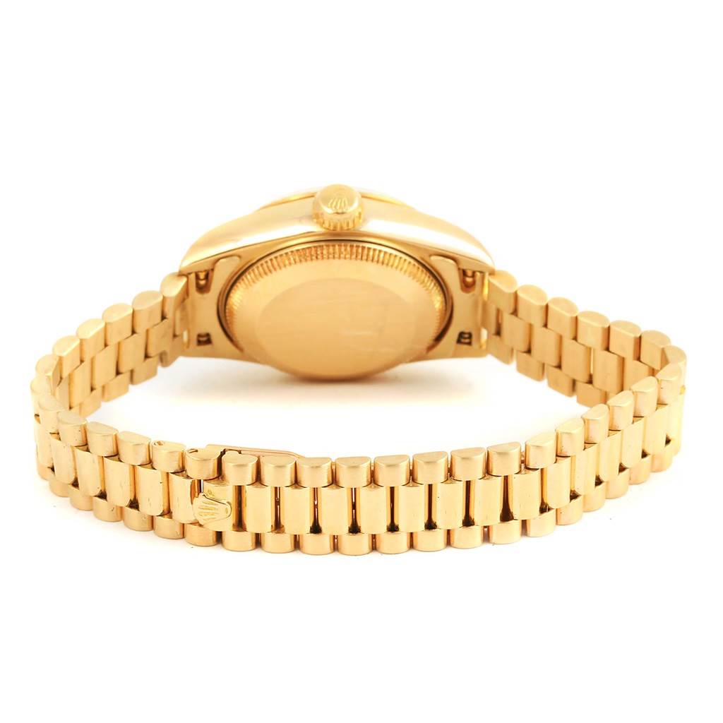 This image shows the back view of a Rolex President 69178 Women's Yellow Gold Champagne Dial 69178 Women's Yellow Gold Champagne Dial watch, highlighting the case back and bracelet.