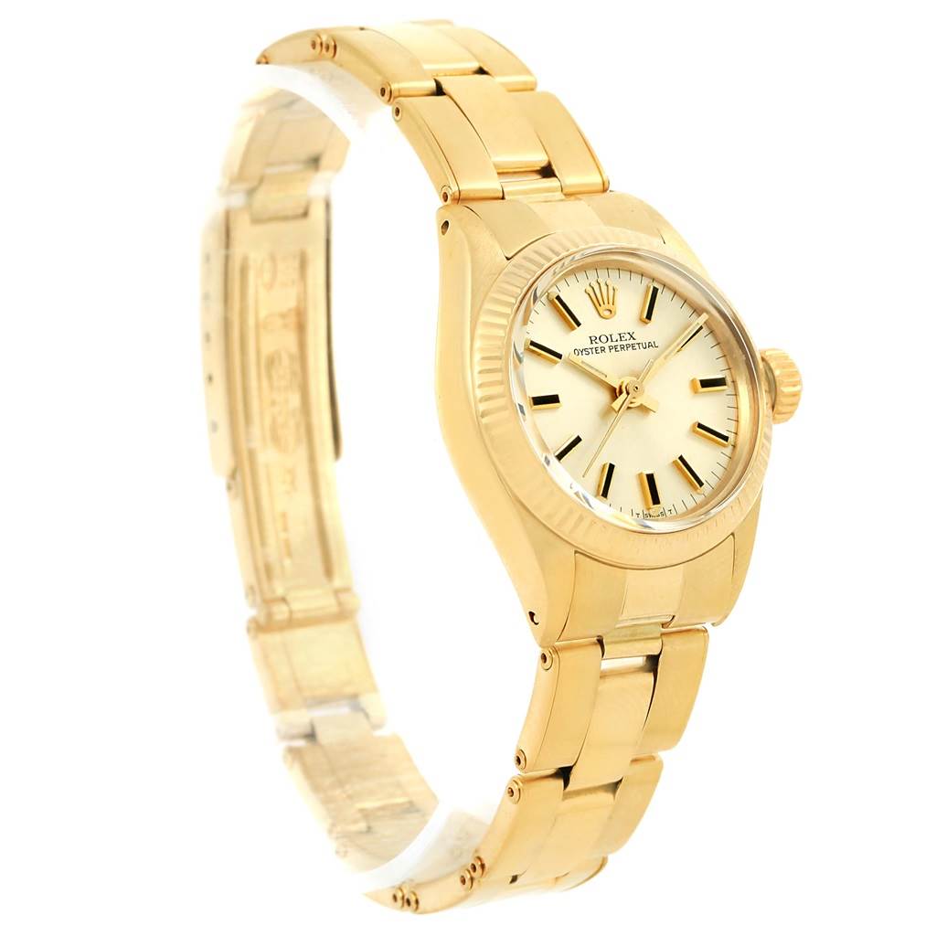 This image shows the front and side view of a Rolex President 6719 Women's Yellow Gold Silver Dial 6719 Women's Yellow Gold Silver Dial model watch, highlighting its gold bracelet and face.