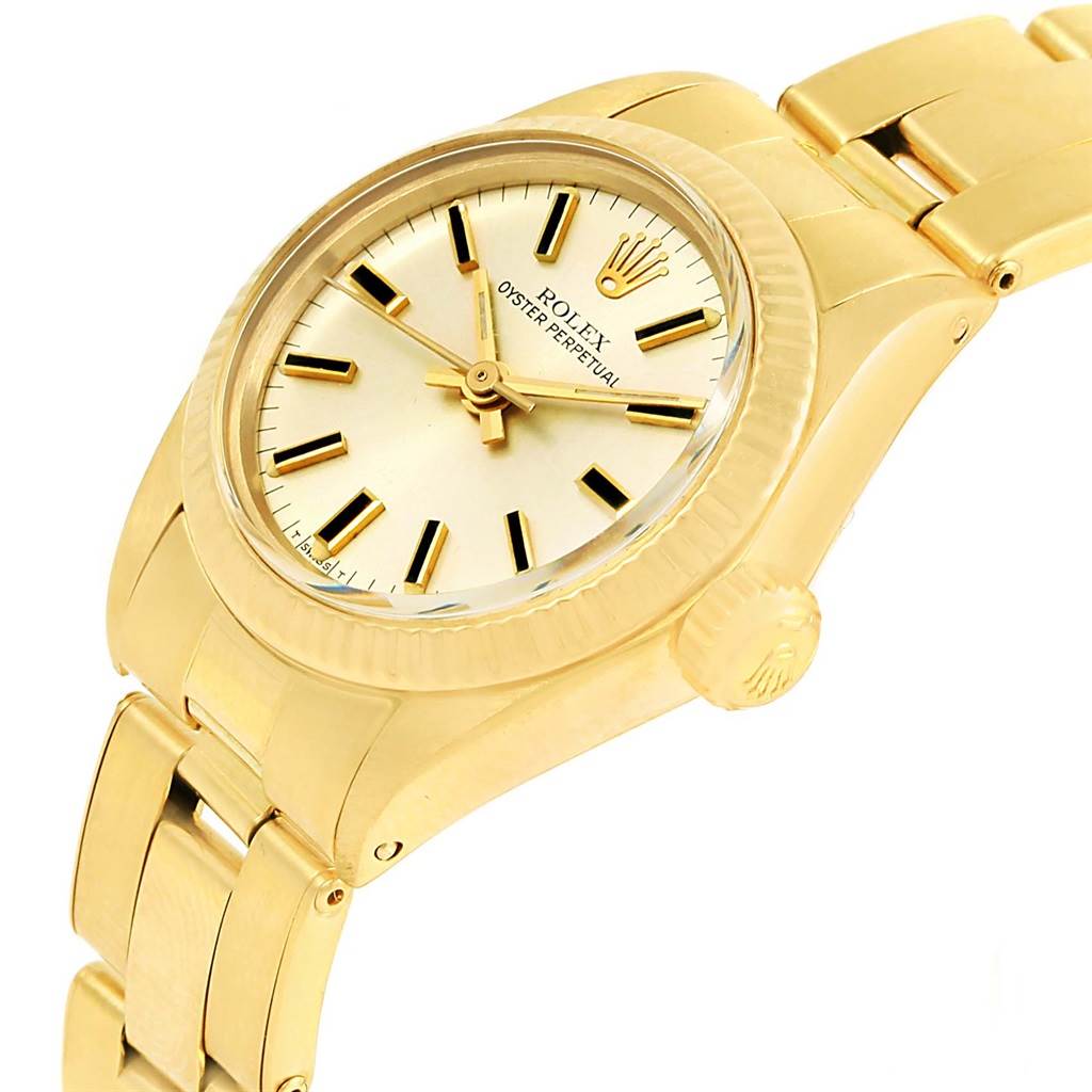 The image shows a close-up angled view of a Rolex Oyster Perpetual President watch, highlighting the dial, bezel, case, band, and crown.