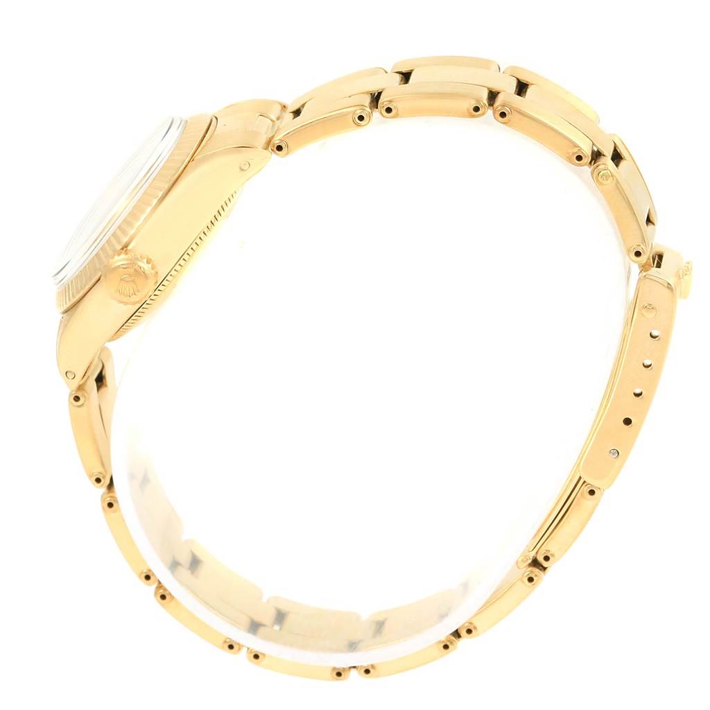 This image shows the side profile and bracelet of the Rolex President 6719 Women's Yellow Gold Silver Dial 6719 Women's Yellow Gold Silver Dial model watch.