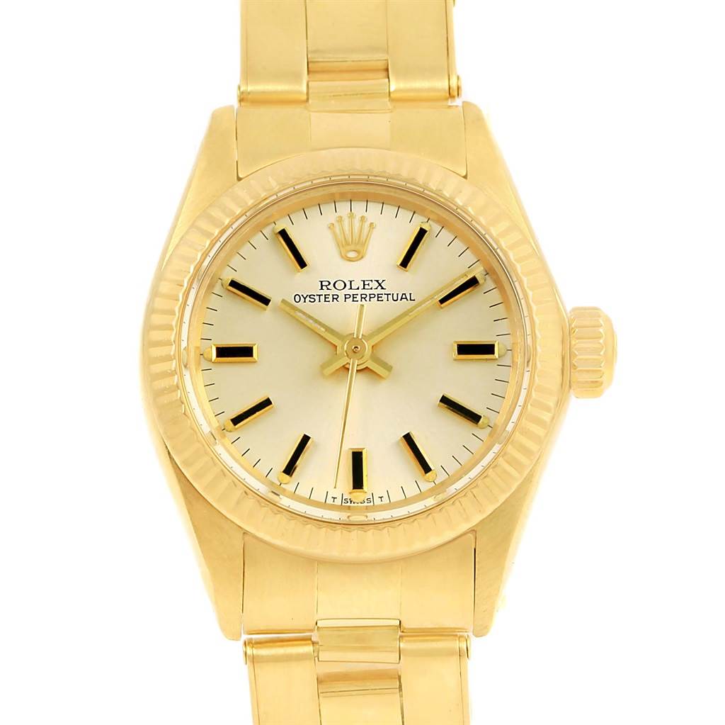 The image shows a frontal view of a Rolex President 6719 Women's Yellow Gold Silver Dial 6719 Women's Yellow Gold Silver Dial model watch with its gold case, bezel, bracelet, and dial.
