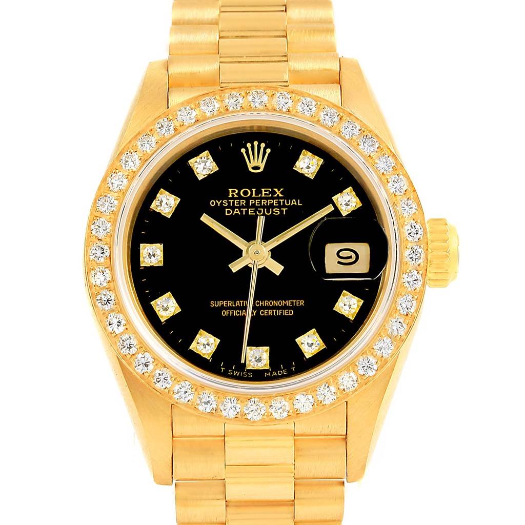 This image shows a frontal view of the Rolex President 69138 Women's Yellow Gold Black Dial 69138 Women's Yellow Gold Black Dial Datejust watch, highlighting the gold case, diamond bezel, and black dial.