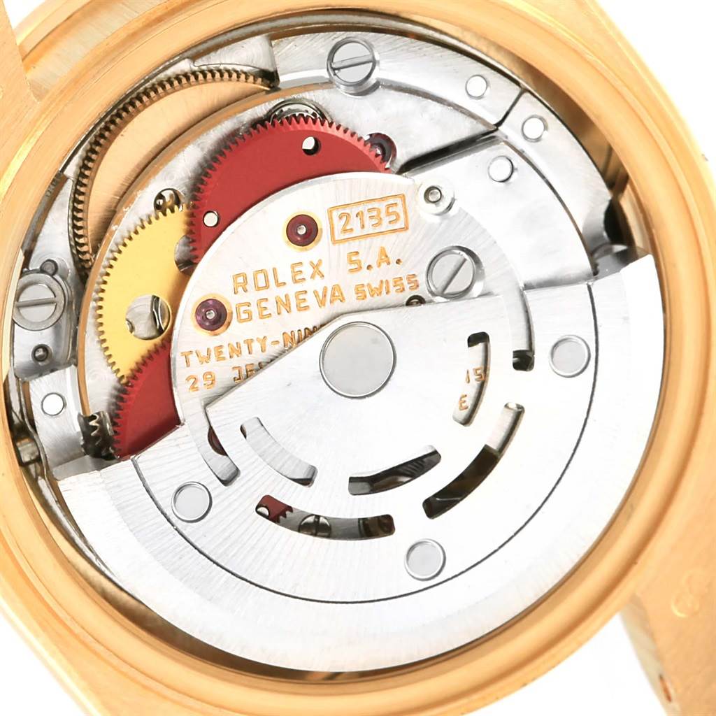 The image shows a close-up of the movement and internal mechanism of a Rolex President 69138 Women's Yellow Gold Black Dial 69138 Women's Yellow Gold Black Dial model watch.