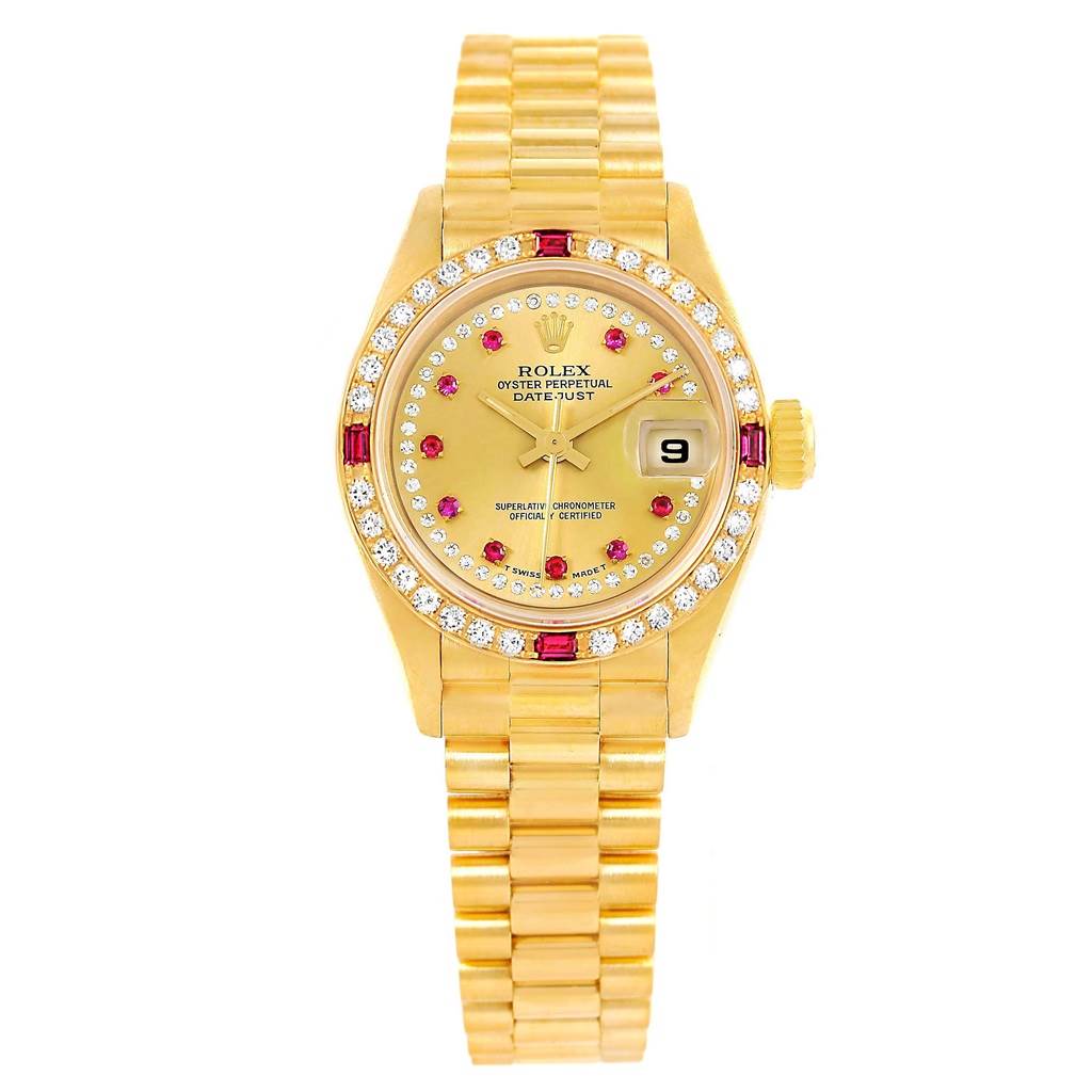 The image shows a Rolex President 69178 Women's Yellow Gold Champagne Dial 69178 Women's Yellow Gold Champagne Dial model watch from a front angle, featuring its gold band and jeweled bezel.
