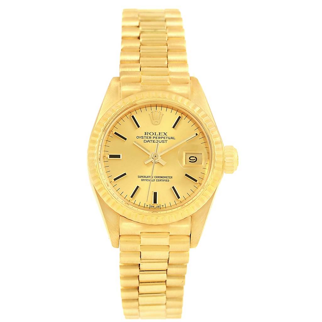 The image shows a front view of the Rolex President 6917 Women's Yellow Gold Champagne Dial 6917 Women's Yellow Gold Champagne Dial model watch, highlighting its gold case, bracelet, and dial with a date display.