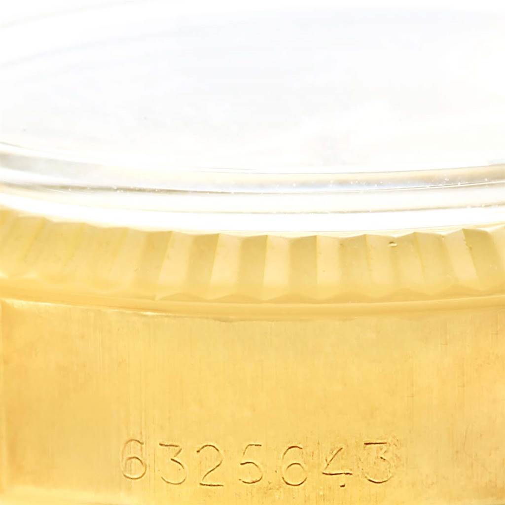 This image shows a close-up of the serial number engraved on the side of a Rolex President 6917 Women's Yellow Gold Champagne Dial 6917 Women's Yellow Gold Champagne Dial model watch case.